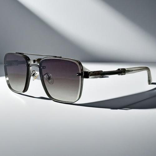 Alma Cruz Gafas de sol aviador con montura metálica dorada y cristales degradados, estilo cuadrado.