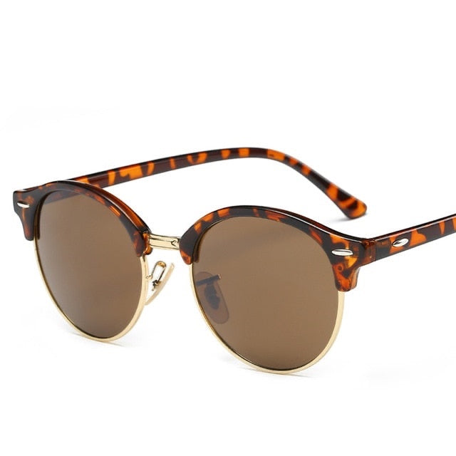 Gafas de sol Alma Cruz Luis con montura de aleación carey y lentes marrones con protección UV400 y efecto espejo.