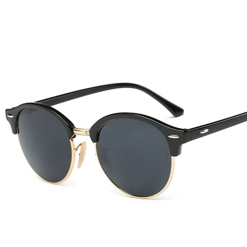 Gafas de sol Alma Cruz Luis con montura de aleación negra y dorada, lentes de poliuretano con protección UV400 y espejo.
