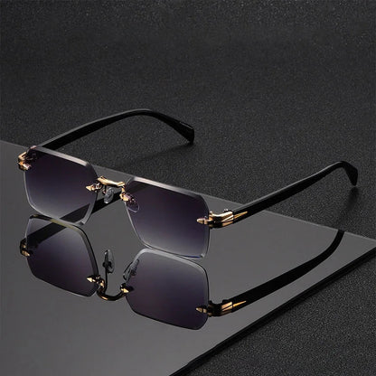 Alma Cruz Fausto gafas de sol sin montura con lentes degradadas y puente dorado