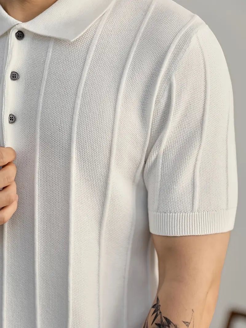 Alma Cruz polo de punto texturizado blanco de algodón peinado con canalé vertical y cuello estructurado.