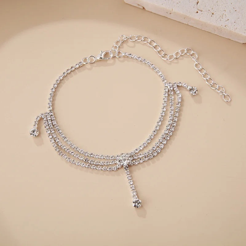 Alma Cruz tobillera plateada multicadena con diamantes de imitación, accesorio de tobillo ajustable y brillante