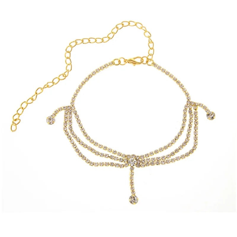 Alma Cruz tobillera dorada de cadena multicapa con diamantes de imitación, accesorio elegante para pies